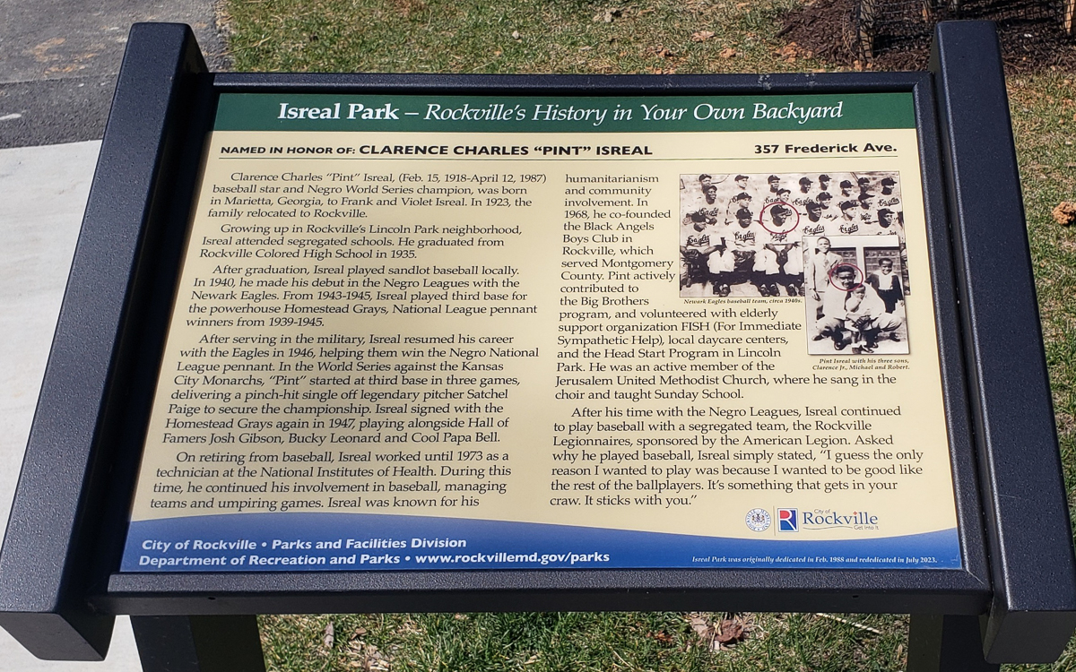 Informational sign about Isreal Park in Rockville, highlighting Clarence Charles “Pint” Isreal's achievements in Negro League baseball and his legacy in the community.