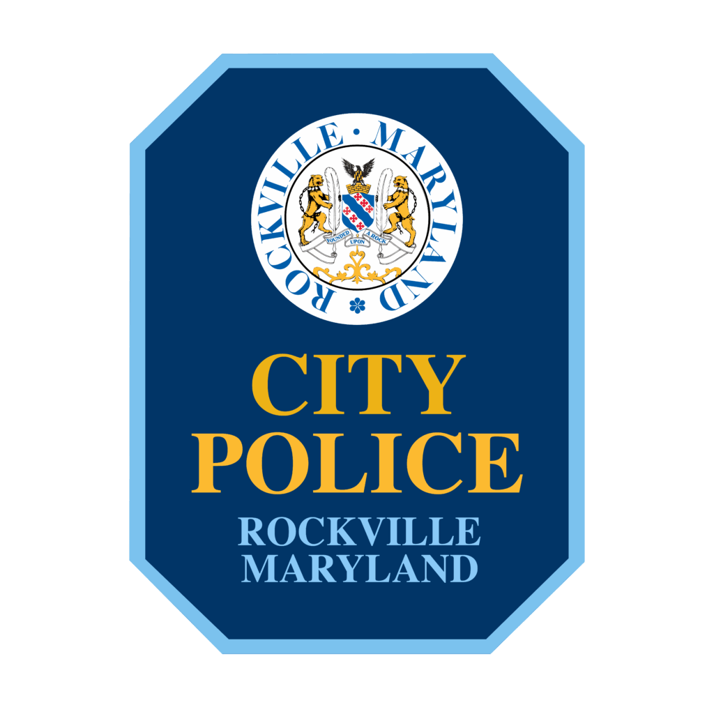 A badge-shaped emblem with the seal of Rockville, Maryland, and the words "City Police Rockville Maryland" in yellow and white on a blue background.